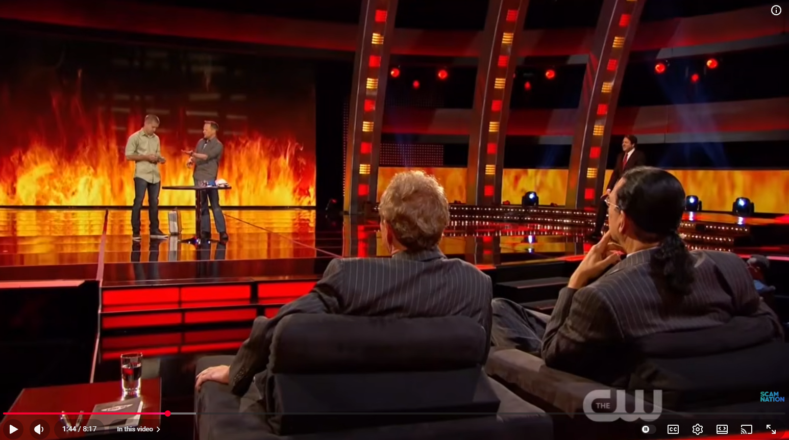 Brian Brushwood performing with a volunteer on Penn and Teller: Fool Us as Penn and Teller watch